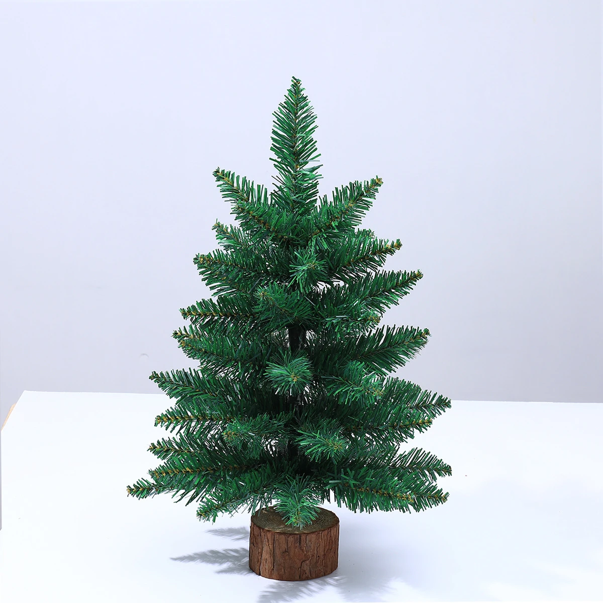 thumbnail image 1 of Pequeño árbol de Navidad de pino verde simulado con plantas, árboles de Navidad, adornos de escritorio para el hogar, decoraciones para la mesa de la fiesta de Navidad, 1 of 5