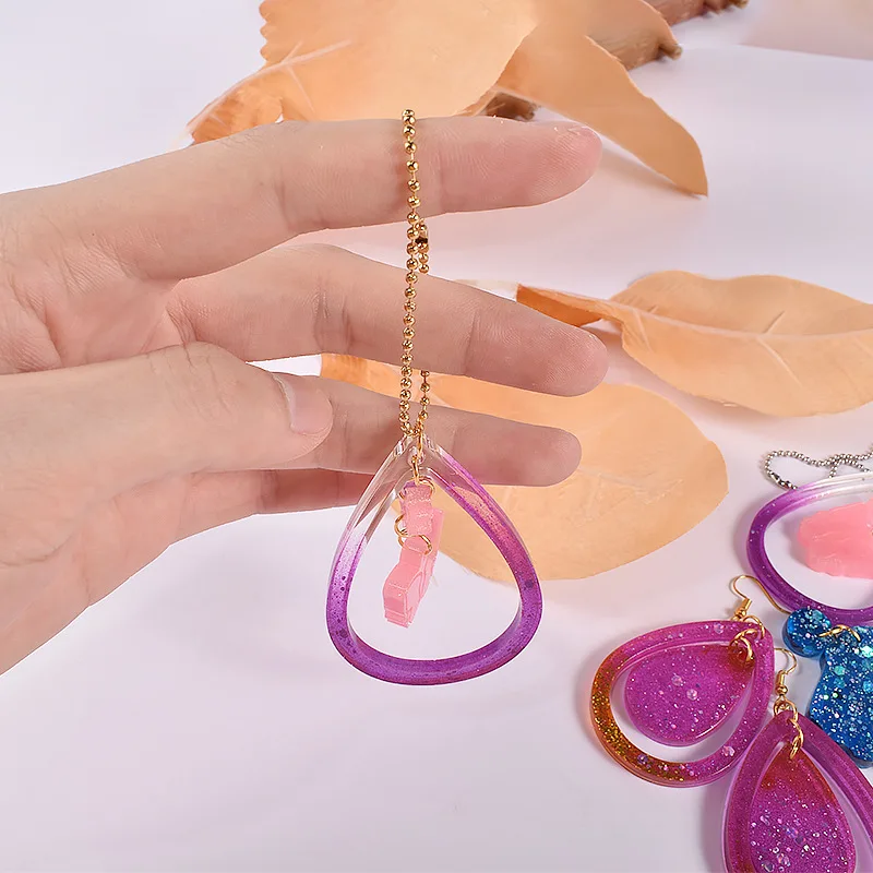 Nifocc Stampo rotondo in silicone per portachiavi con ciondolo in resina con fori per gioielli fai da te, 4 pezzi