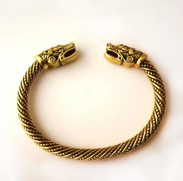  Pulsera de cabeza de dragón vikingo nórdico de metal, anillo de  brazo vikingo, brazaletes para hombres, plateado : Ropa, Zapatos y Joyería