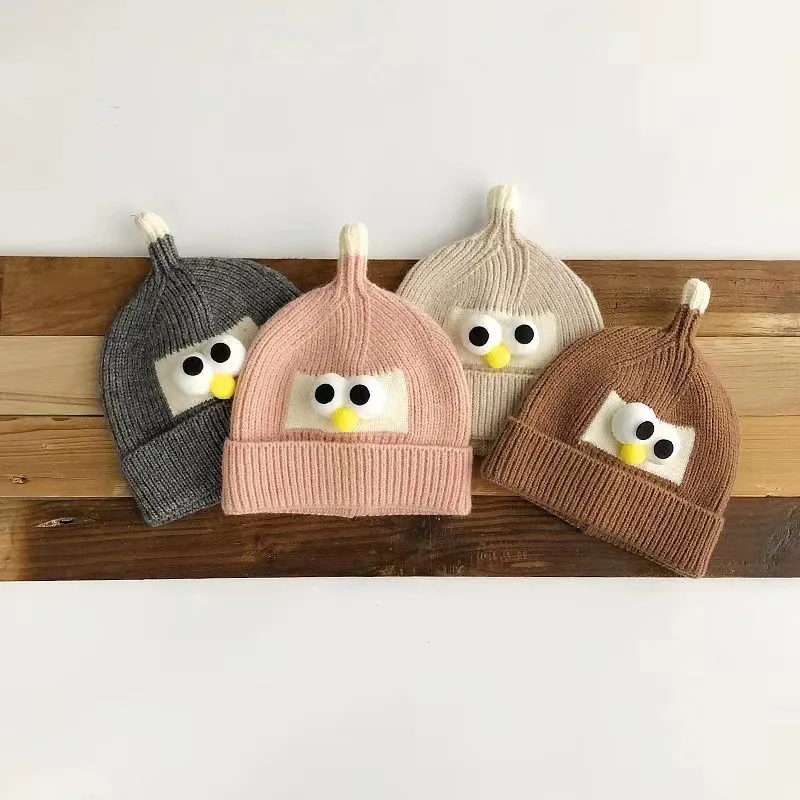 

Korean Knitted Baby Cap With Eyes Cute Pompom Kids Hat Beanie Warm Autumn Winter Boys Girls Ear Protection Bonnet Caps