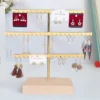 Support organisateur de bijoux à 52 trous, Base en bois, avec support pour boucles d'oreilles en métal, idéal pour la décoration de la maison et les accessoires de mariage