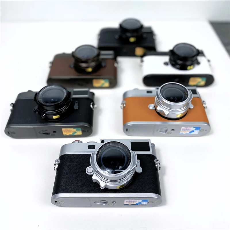새로운 M11 Leica 모델 마이크로 싱글 카메라 장난감 모델에는 스튜디오 쇼룸 소품이 포함되어 있습니다.