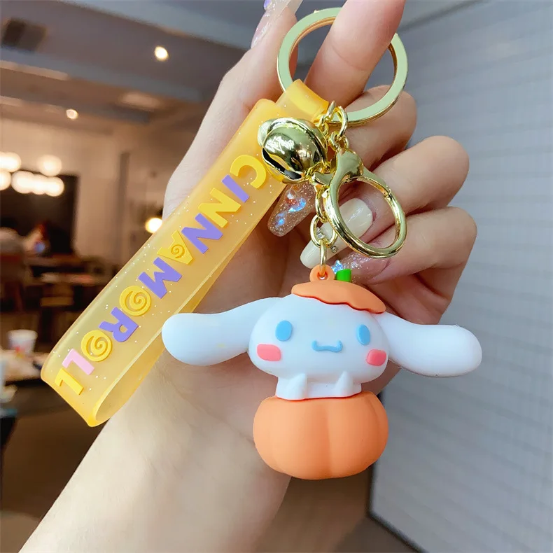 thumbnail image 1 of Llavero creativo de Sanrio con forma de conejo azul Cinnamoroll, llavero con cuerda de mano de descompresión, colgante, llavero de coche para pareja, adorno para bolso, 1 of 5