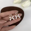2022 New Simple Enamel White Bow Ear Clip on Earrings Female Fashion Sweet Pearl Heart Clip Earrings Without Piercing for Women 1