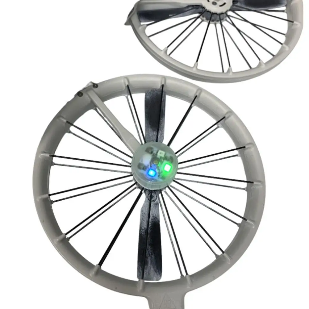 Lot de 4 lampes de sécurité LED pour drone DJI FLIP, disposées sur fond noir, éclairant en rouge et blanc.