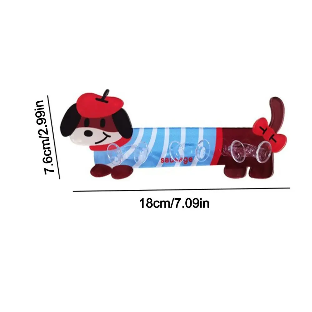 Three variations of the cute acrylic dachshund wall hooks featuring different colorful cartoon outfits with 3 built-in hanging slots.