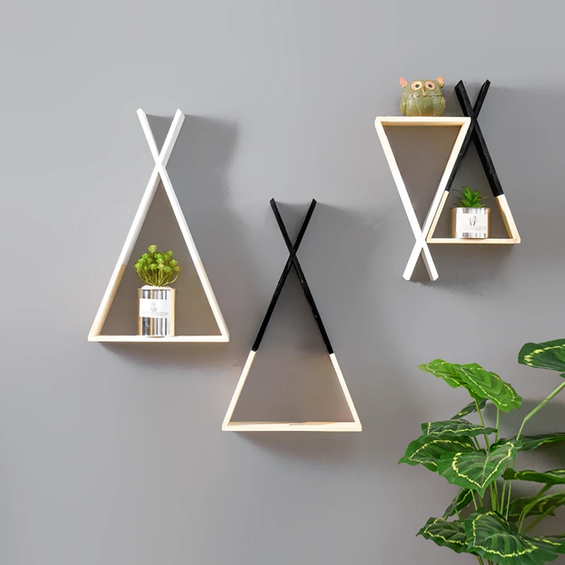 

Creative wall hanging triangular pine INS living room with shelves on the background wall, wooden partition wall decoration with
