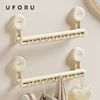UFORU Bathroom towel rack Perforation-free wall hanging suction cup advanced sense bathroom wall hanging towel rack storage rack 1