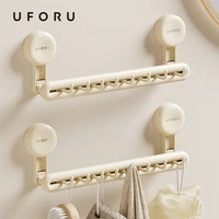 UFORU Bathroom towel rack Perforation-free wall hanging suction cup advanced sense bathroom wall hanging towel rack storage rack 1