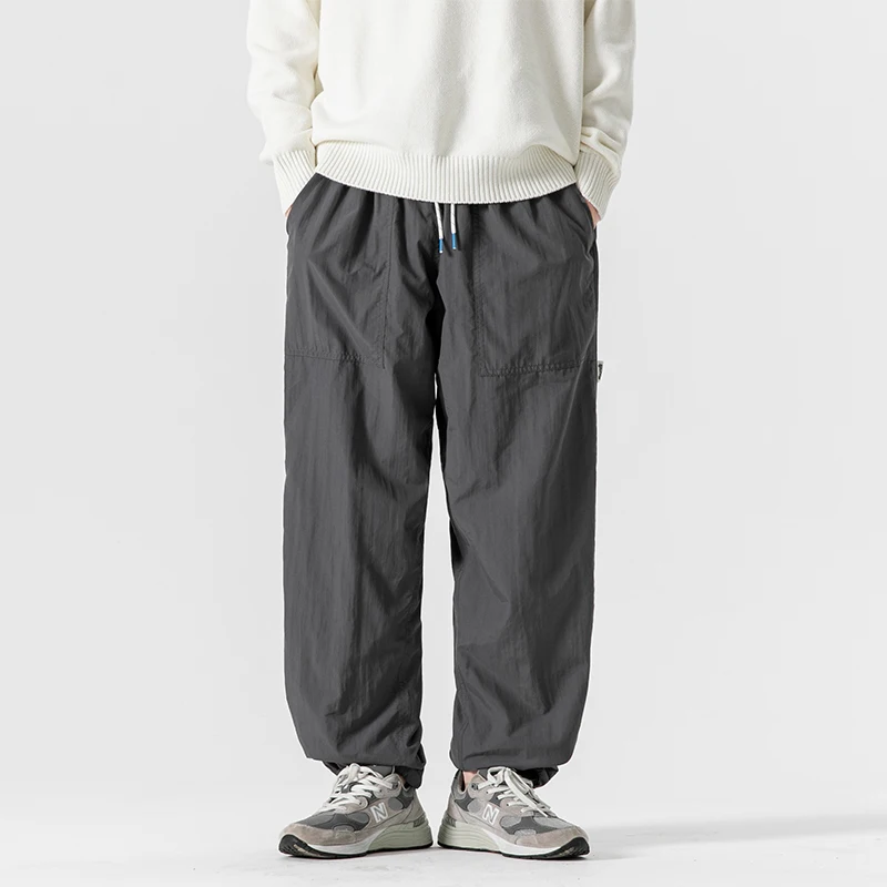 봄 여름 Lightwear 빠른 건조 바지 남성 여성 야외 방수 느슨한 캐주얼 트랙 Techwear 카고 바지 남여 바지