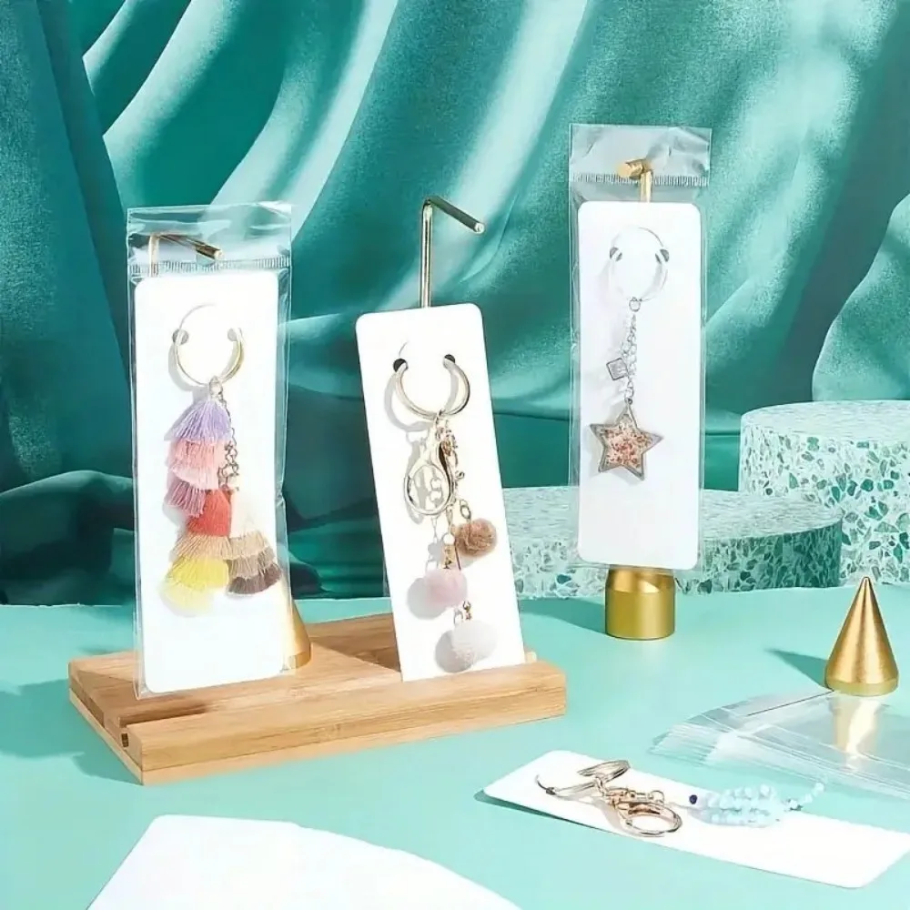 Jewelry Display Cards with Protective Sleeves 100-Pack Ideal for Necklaces Earrings & Keychains Crafted Gift Tags