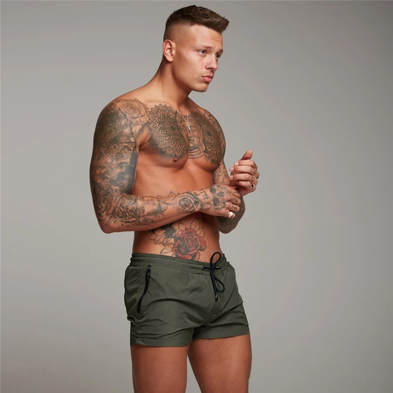 Brand Running Three-quarter Pants Breathable Quick Dry Sports Fitness Shorts Gym Workout Short Pants Swimwear Men's Sportswear 2