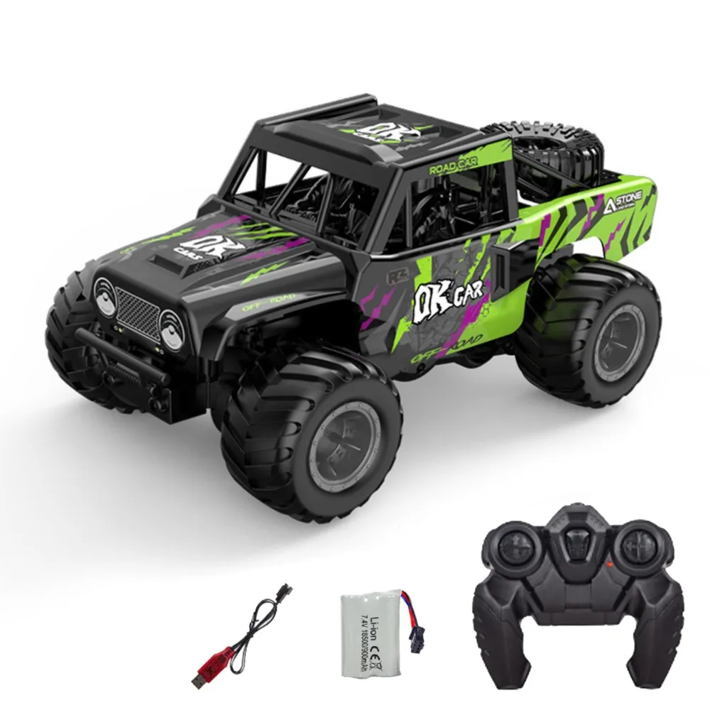Voiture RC tout-terrain 1:18 JJRC Q191 amphibie étanche 4x4 effectuant une rotation à 360° sur l'herbe