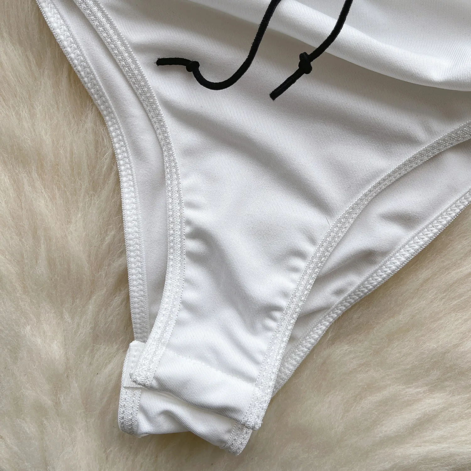 white lace-up corset bodysuit side view