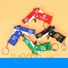 1PC MINI Toy Gun Keychain 50 Rubber Bands Folding Rubber Band Gun Shooting Pistol Alloy Key Charm Pendant Kid Outdoor Party Gift 2