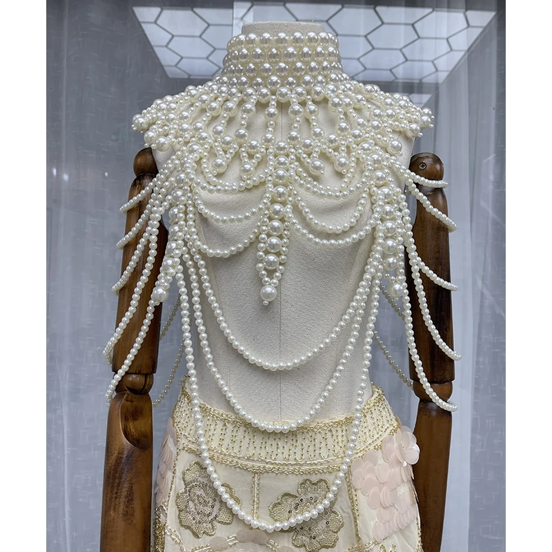 Luxury Party Tops Women Pearls Beaded Turtleneck Chain Heavy Handmade Cele  Ins Sleeveless Hollow Out Blousa Tops NZ85 - AliExpress
