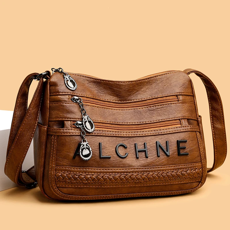Designer Travel Bags: Leather Messengers & Satchels