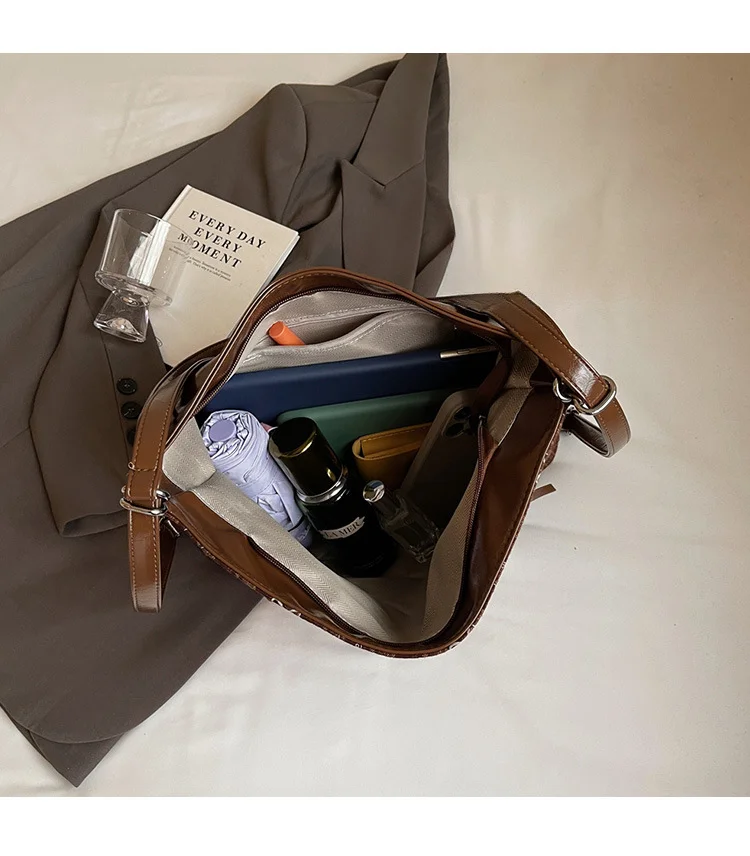 2024 summer and autumn new tote niche shoulder versatile butterfly armpit bag, high-end plaid women's bag_voghion.com