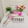 Portable striped makeup bag, small size, high-value handbag, mini portable makeup storage bag, waterproof women's bag cs013 1