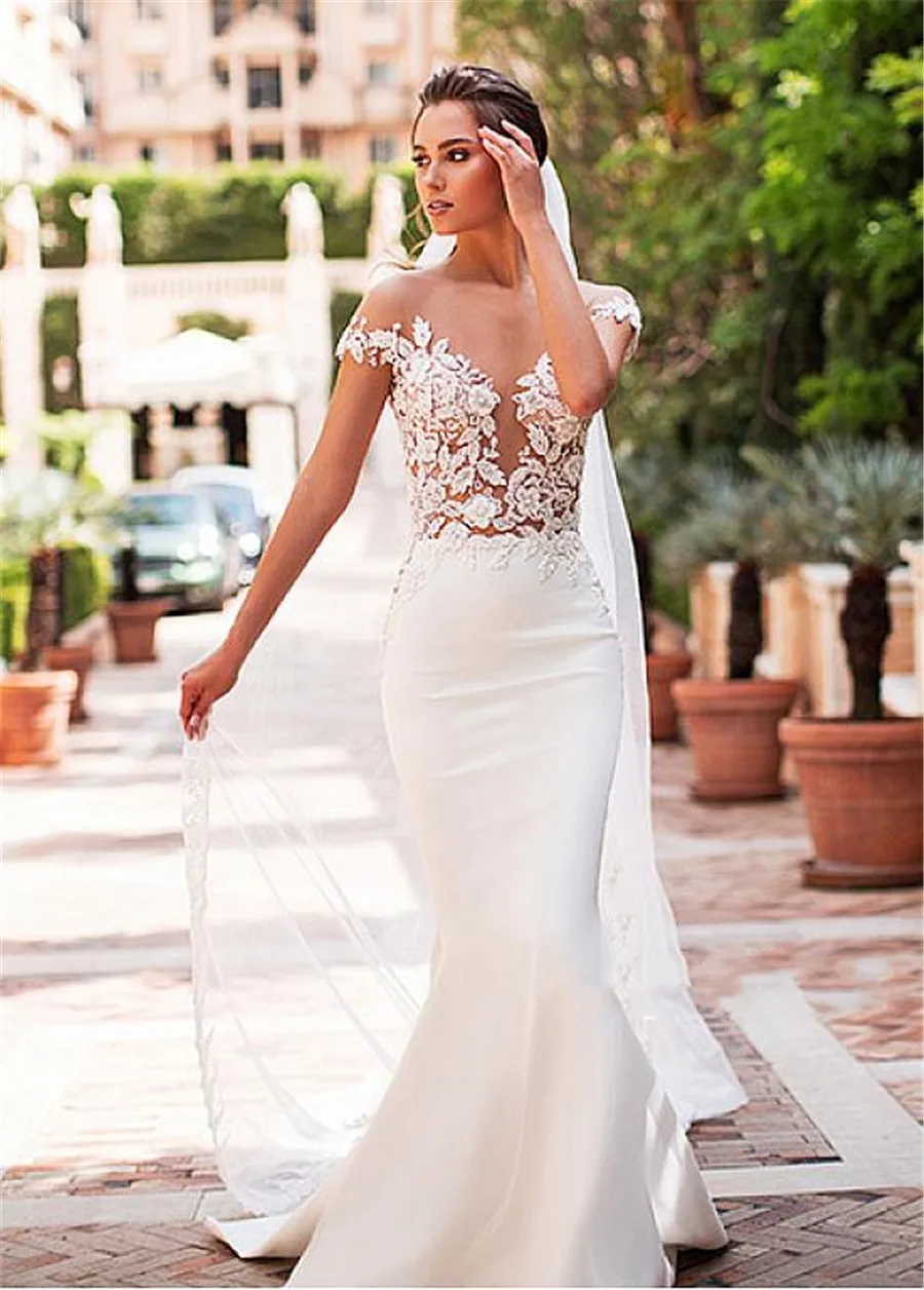 

Exquisite Sheer Nude Tulle Mermaid Wedding Dresses Cap Sleeves Lace applique Sexy See Through Bridal Dress