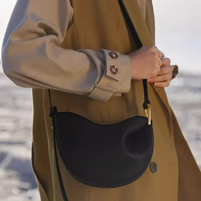 half moon leather bag side view
