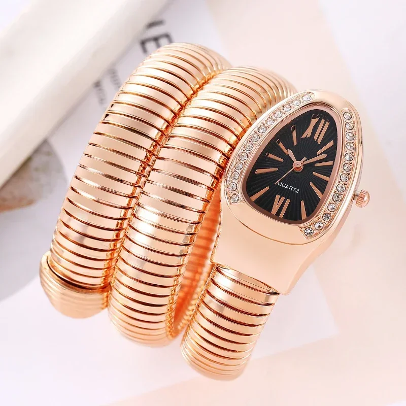 Serpentine Womens Quartz Watch: Diamond Inlaid Wrist