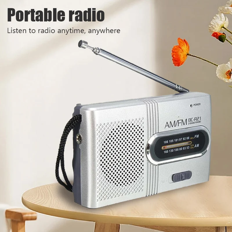 Portable radio handheld dual band AM FM music player speaker with telescopic antenna outdoor stereo