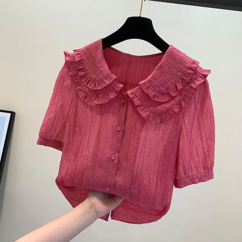 

Elegant Peter Pan Collar Spliced Ruffles Sweet Shirt Women's Clothing 2023 Summer New Casual Tops Loose Office Lady Blouse