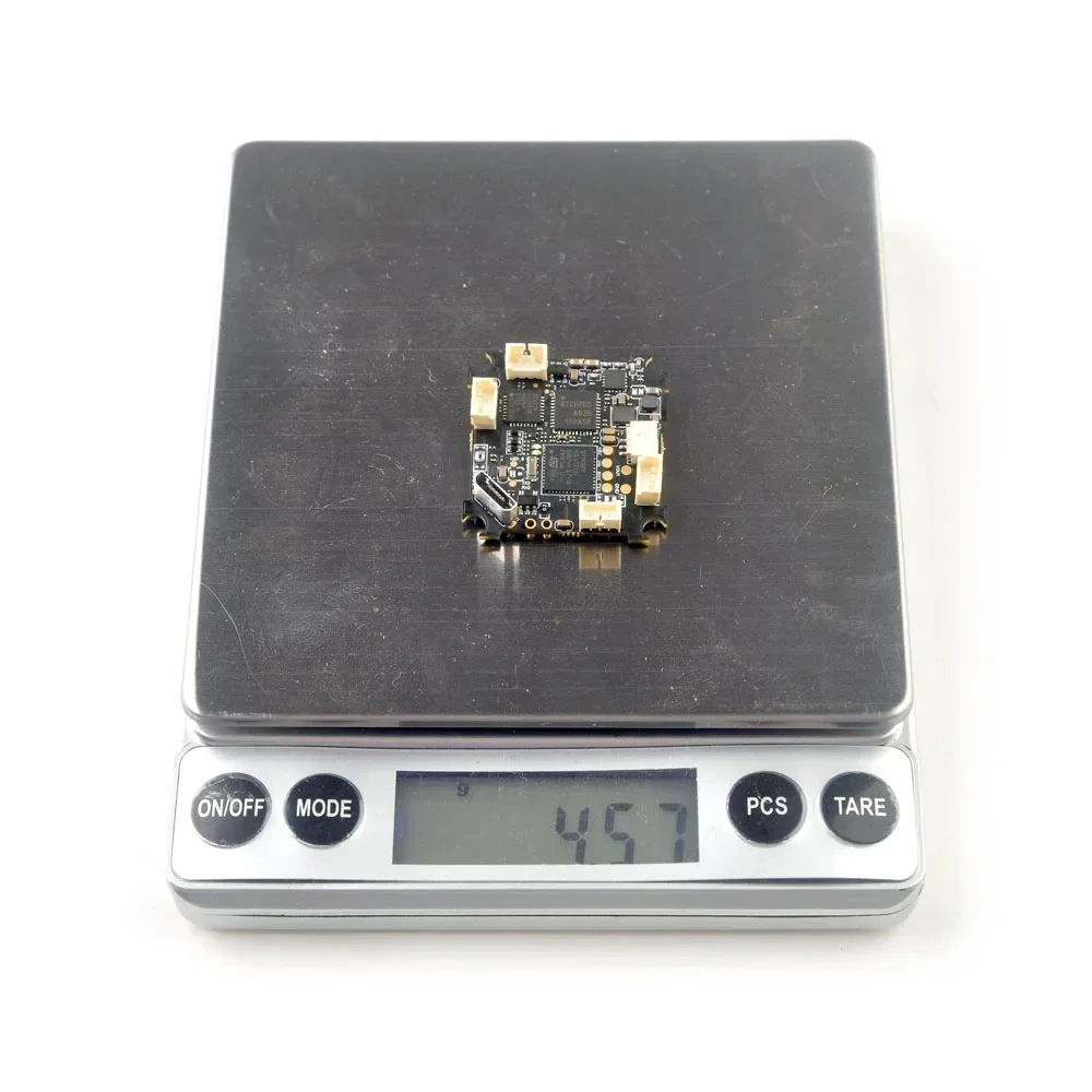 Contrôleur de vol AIO F4 5 en 1 avec récepteur ExpressLRS SPI 2.4GHz et VTX 400mW pour Tiny Whoop, échelle et dimensions.