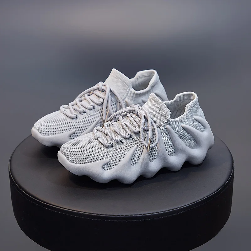 

Couple models ins breathable socks shoes female 2023 summer new Korean version of the fly weaving small cage running male casual