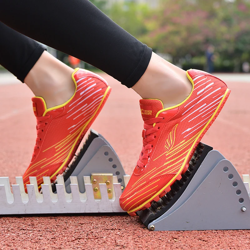 Fashion Men Women Track and Field Nail Shoes Running Training Ultra Light Soft Track and Field Athletes Running Spiked Shoes