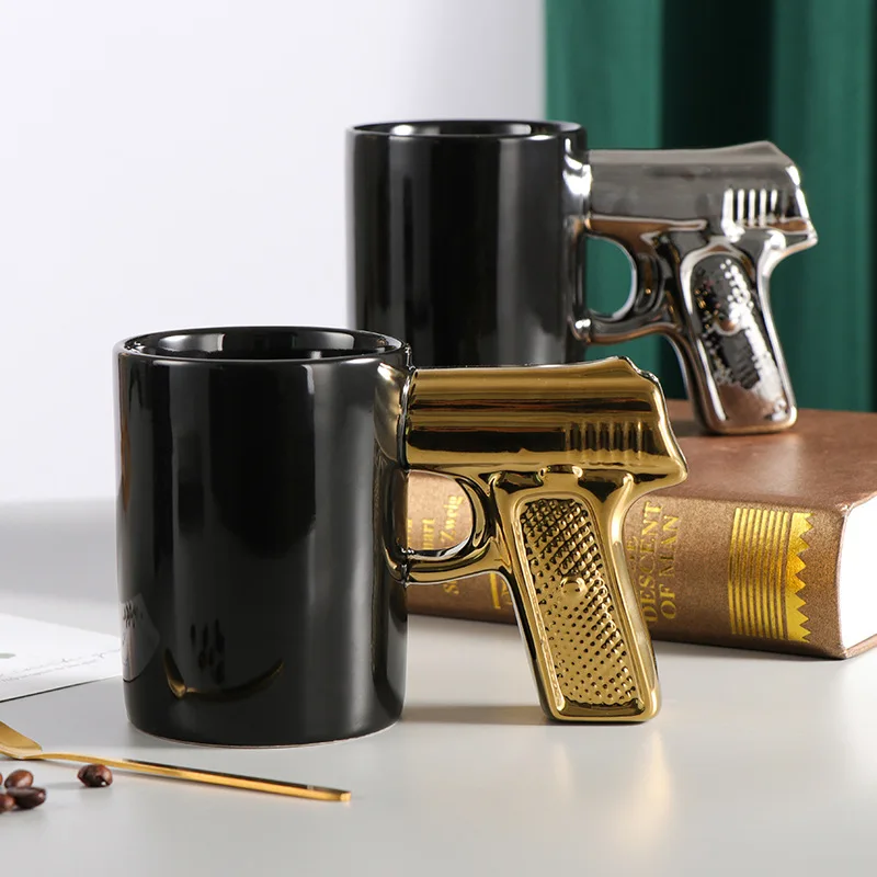 

Creative Ceramic Cup Gold Silver Pistol Cup Gun Handle Mug Personalized Water Cup Coffee Cup 3D Modeling Cup Master Cup