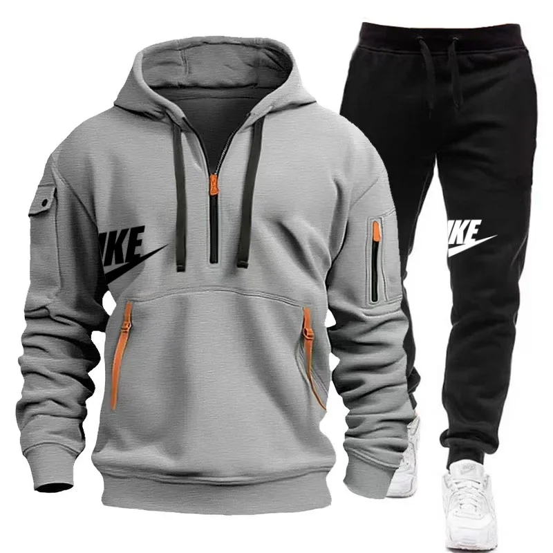 Conjunto deportivo informal para hombre con sudadera con capucha multibolsillos y pantalones deportivos en estilo otoño-invierno.