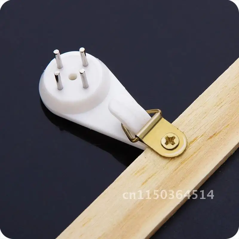 Description Picture 5 of item10pcs Seamless White Plastic Invisible Wall Mount Photo Picture Frame Nail Hook Hanger Hard Picture Frame Wall Hooks Nail