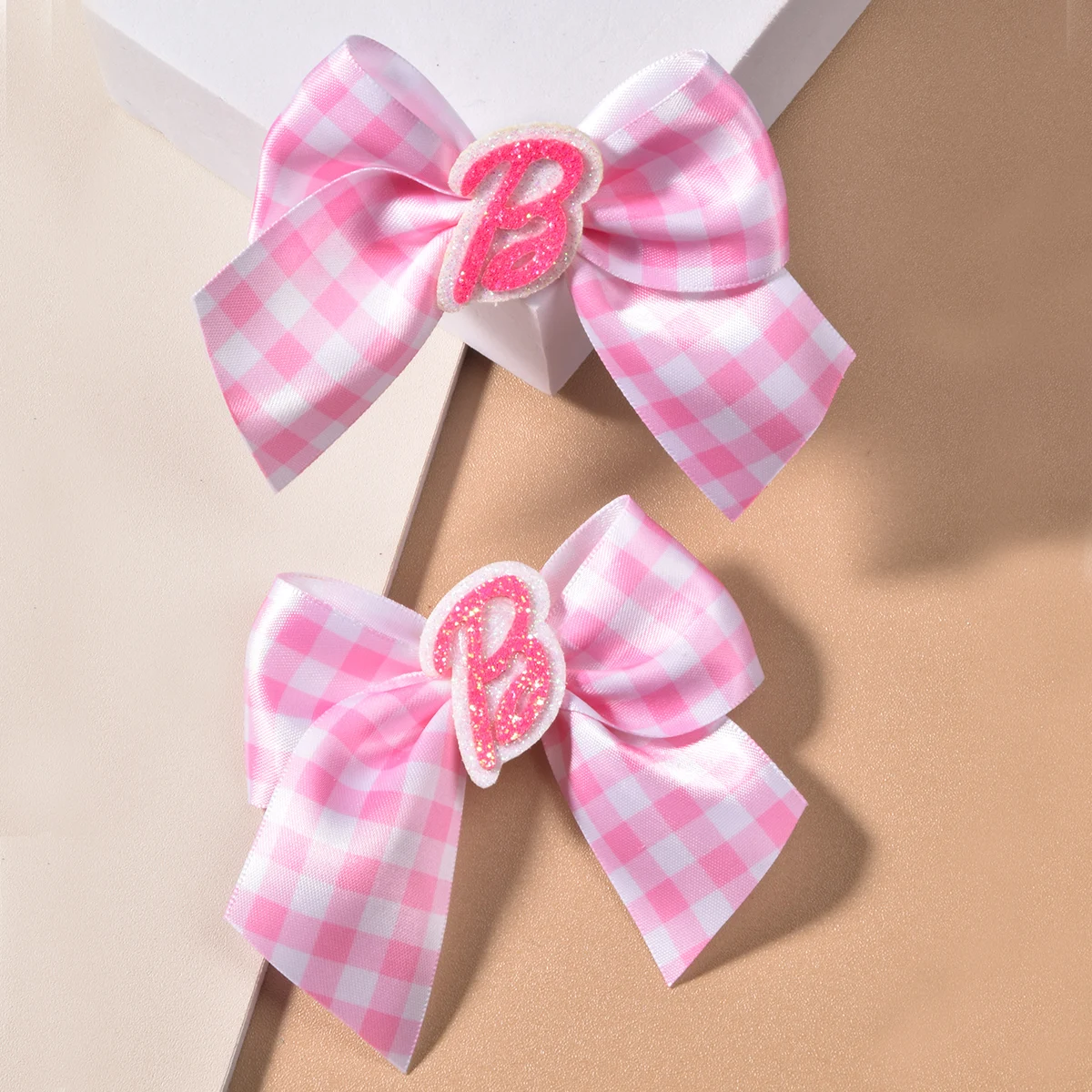 Women's Pink Webbing Ear Clips with Green Lettering - Fashionable and Affordable Accessories