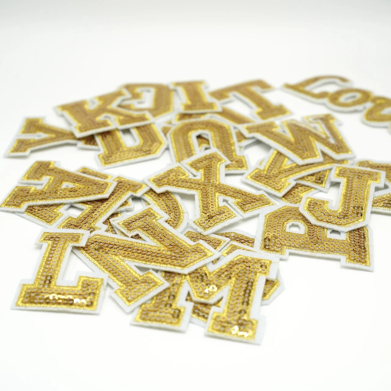 Gold Thread Letters Gold Embroidered Letters: A Stylish and Versatile Addition to Your Wardrobe