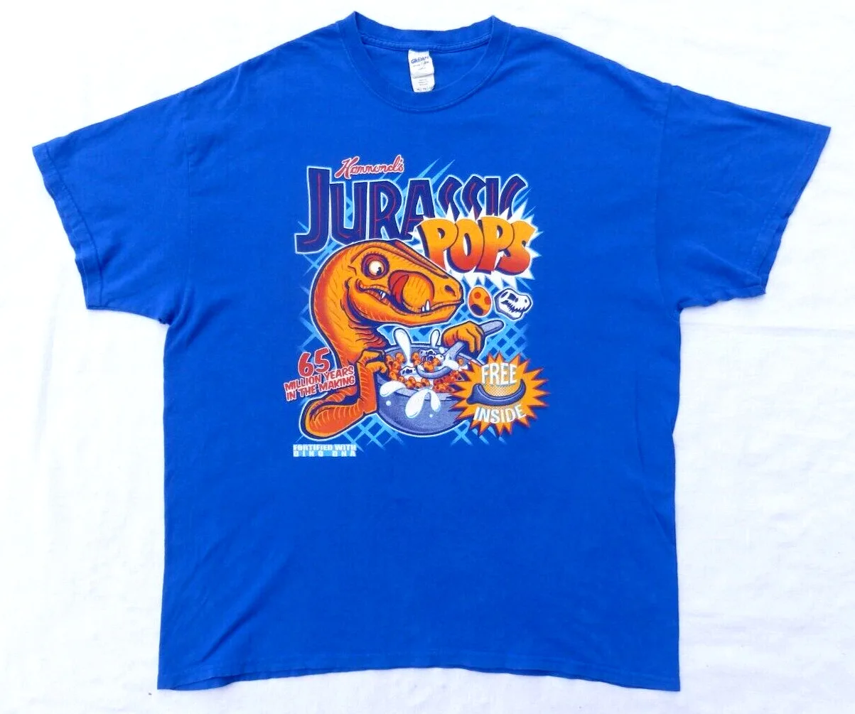 Jurassic Pops Mens Xl Dinosaur Park Velociraptor Cereal Funny Humor Blue T Shirt Maniche Lunghe O Corte