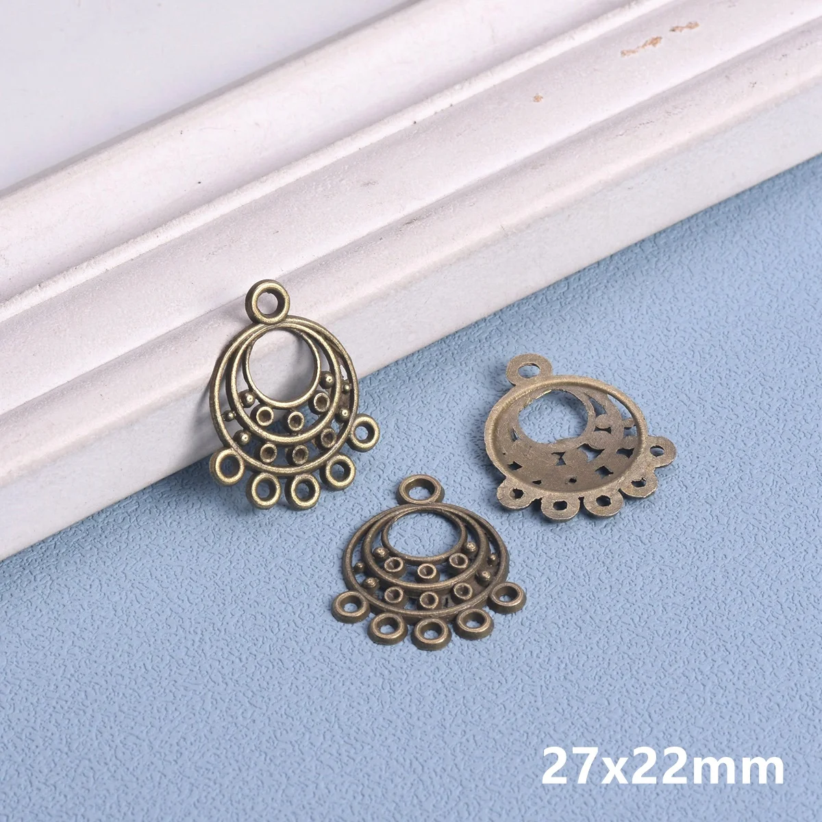 8 Connettori geschlungene in Vintage Bronze di Vintage Parts, gioielli