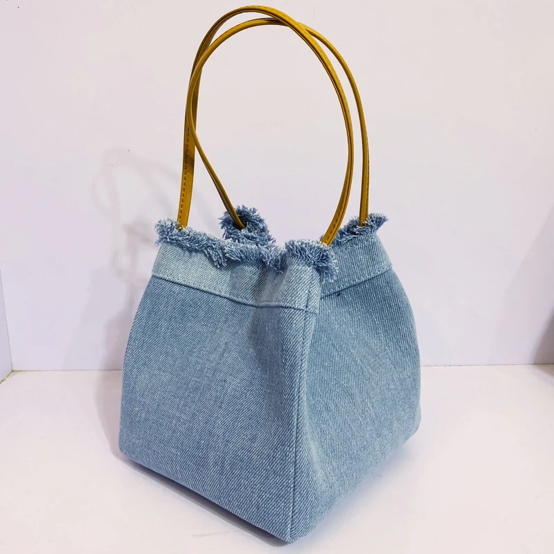 thumbnail image 1 of Mini bolsos de mezclilla para mujer, bolsos y carteras de diseñador de lujo, novedad de 2023, bolso de hombro de tela con borlas y remaches, 1 of 5