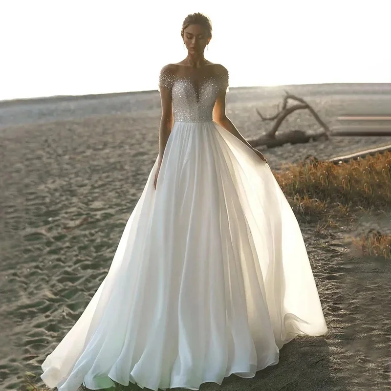 

Exquisite Sweetheart Neck A-Line Glitter Wedding Dresses Off the Shoulder Sleeveless Sweep Train Bridal Gowns Robe De Mariée