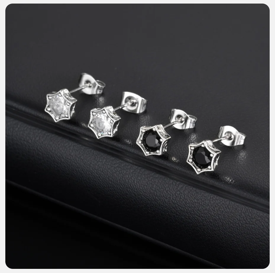 Unisex star-shaped stud earrings with zircon stones in punk style, suitable for men and women, available in black and clear silver
