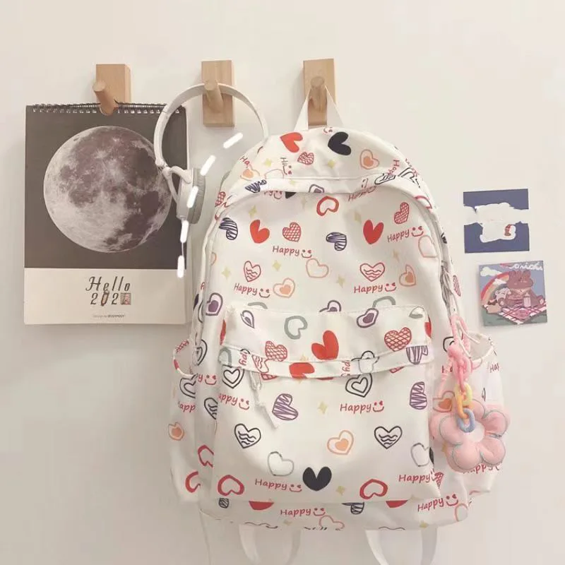 Zaino leggero per adolescenti zaino per cartoni animati dolci con tasca frontale per lavori sportivi scolastici