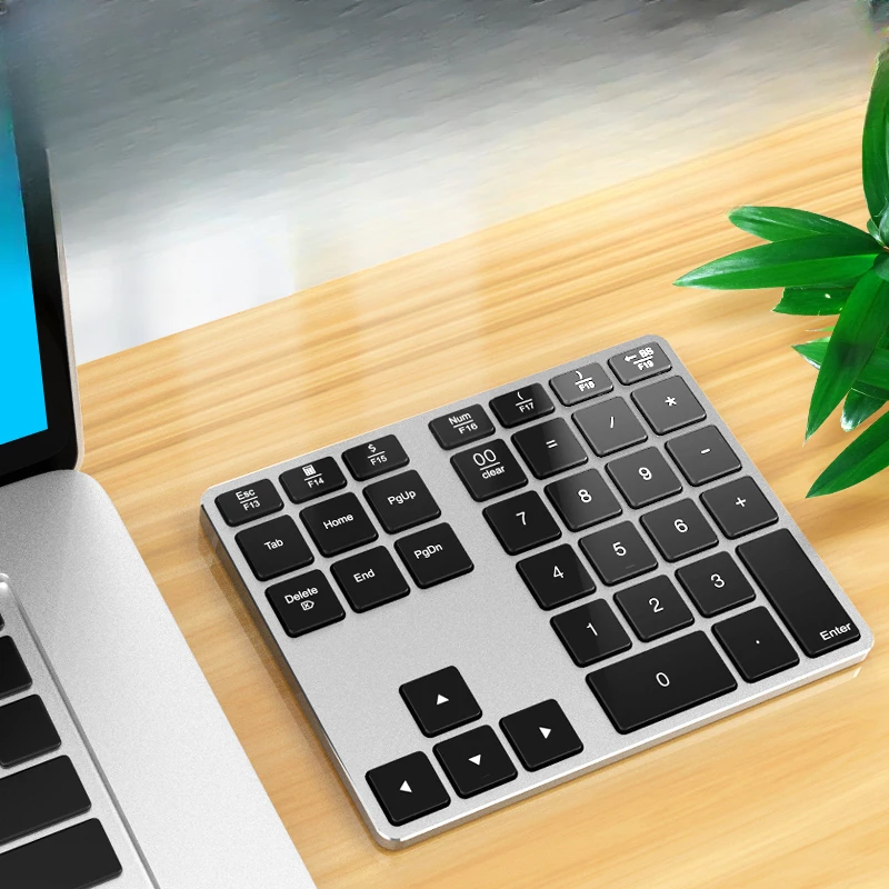 

Bluetooth wireless digital keypad metal charging financial accounting Apple notebook tablet mobile phone computer universal