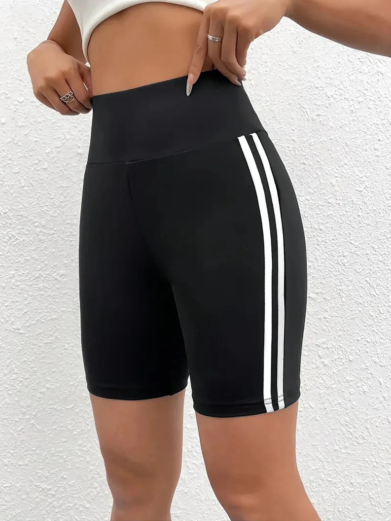 560937-537f1e.jpg High Stretch Plus Size Athletic Shorts for Women Sporty Knit Mid Thigh Pants with Side Stripes Fashionable and Comfortable Pants - Image 1