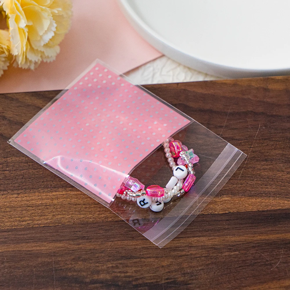 100 Stücke 7x7 cm Mehrere Stile Kunststoff Selbstdichtende Süßigkeiten Cookie Tasche Für Schmuck Party Geschenk Verpackung Großhandel kleine Unternehmen – Detail 6