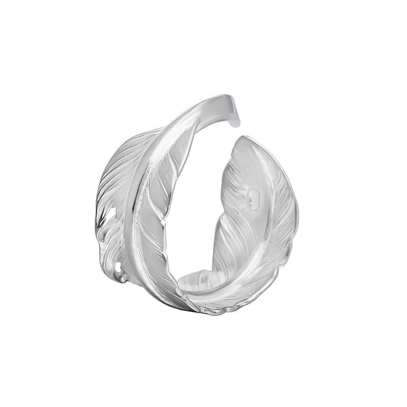 Мужское и женское кольцо из серебра 100% пробы с перьями