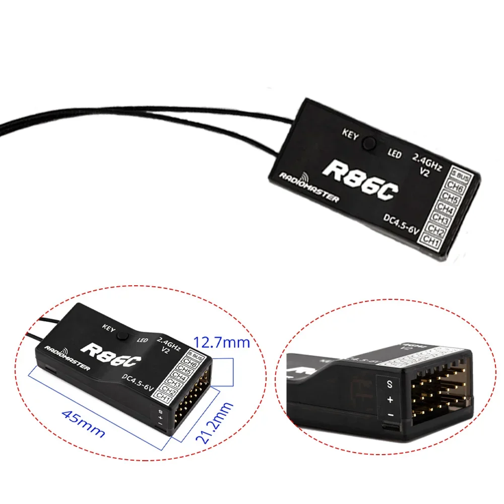 Vue rapprochée du récepteur RC 2.4GHz R86 montrant les broches et le boîtier noir.