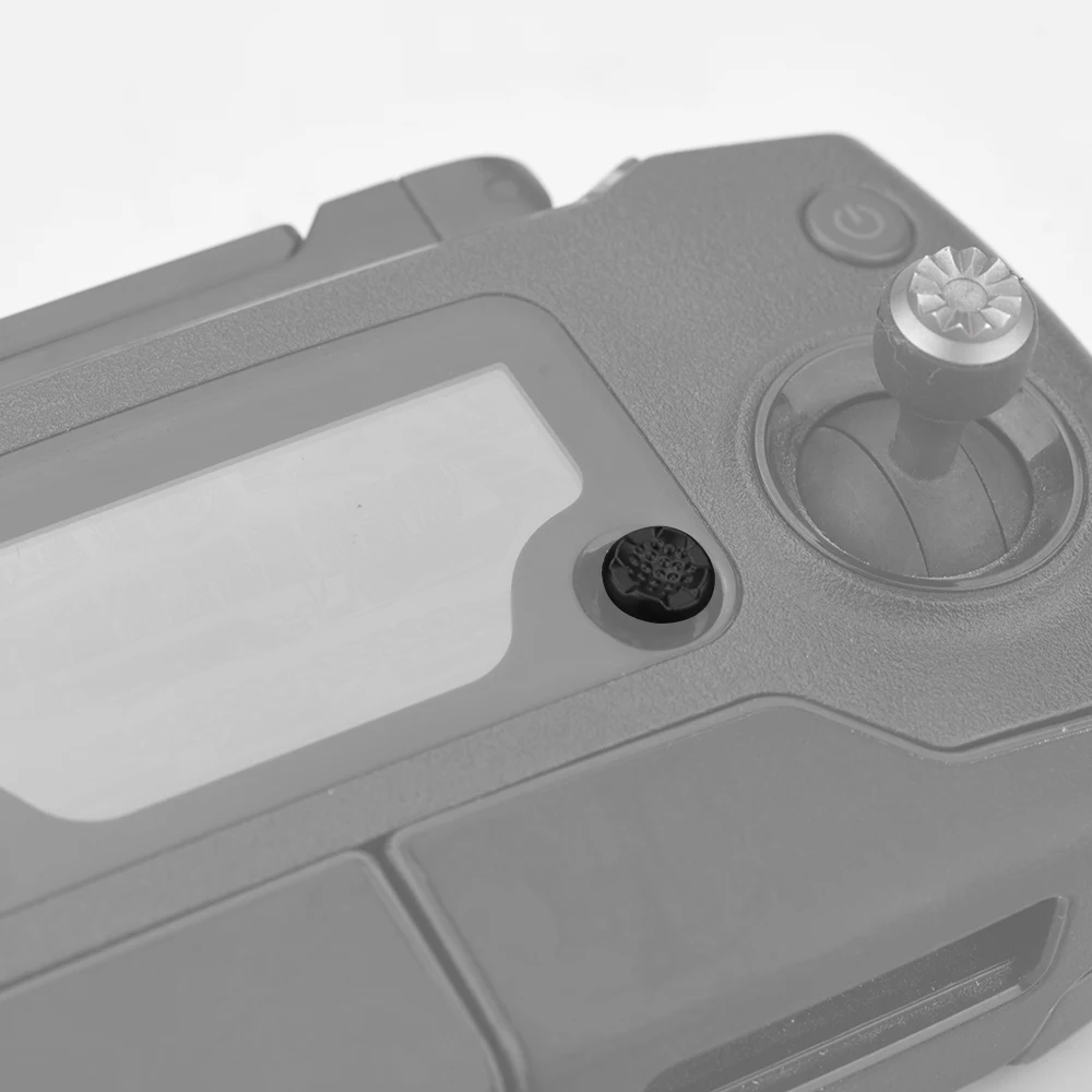 Bouton Rocker de rechange pour télécommande DJI MAVIC Pro et MAVIC 2 incliné, détaillant la texture antidérapante.