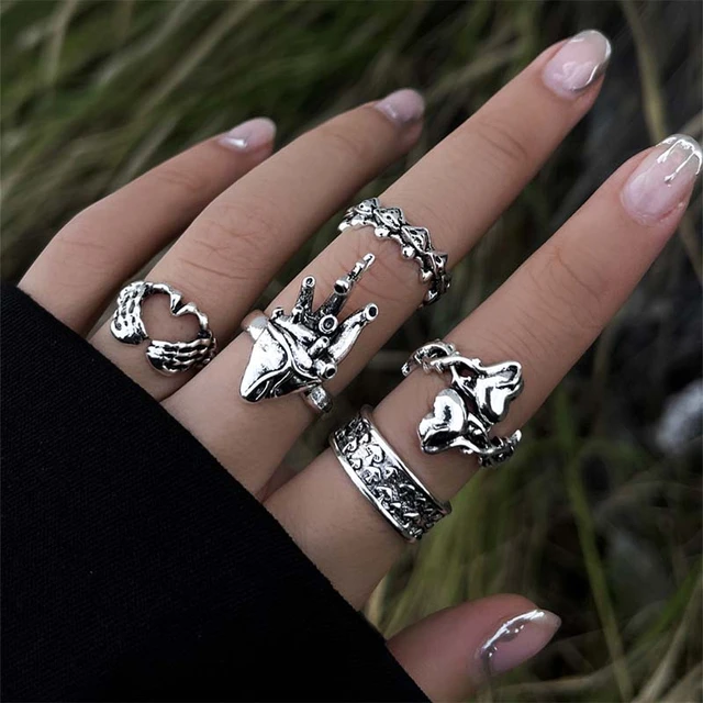 An epic TGF collection from @with_the_n From left to right: Medium Evil  Skull Star Trucker Medium Kudu 13 ring Large E… | Funky jewelry, Edgy  jewelry, Hand jewelry