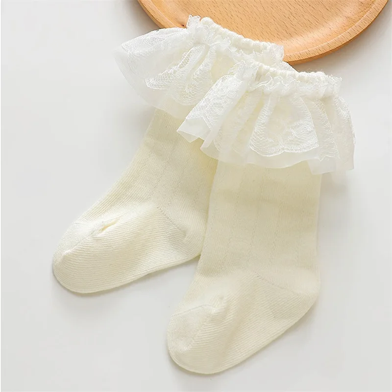 Adorable Infant Lace Trimmed Knee High Socks with Breathable Fabric and Ruffle Detail for Stylish Babies and Toddlers